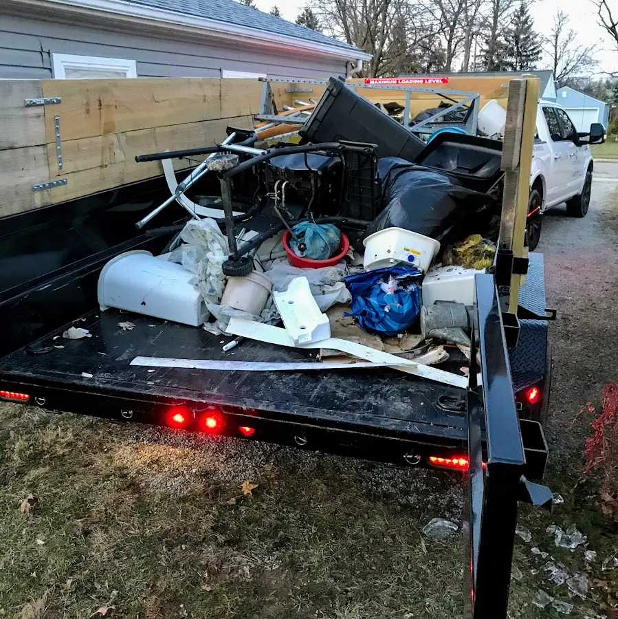 Roll-off dumpster delivered to a residential driveway in Cut Off